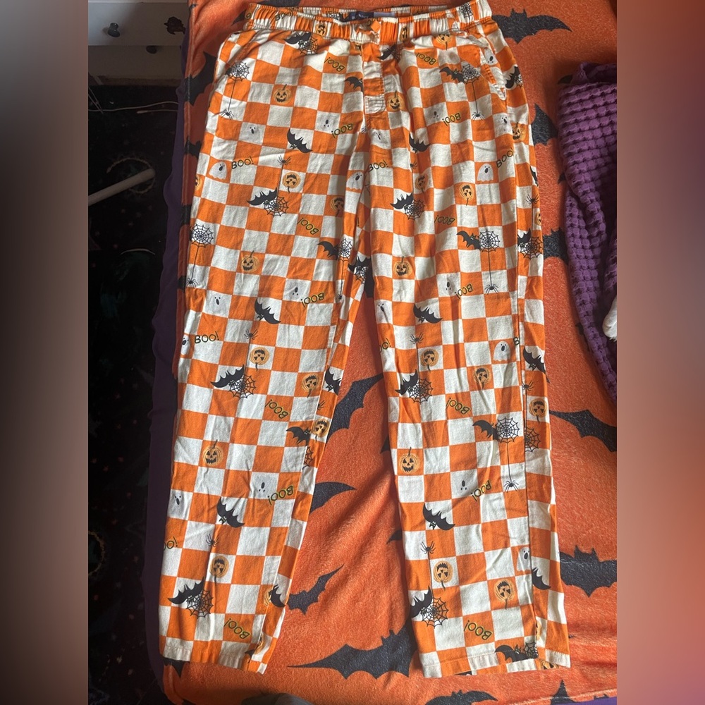 Old Navy Halloween pajama pants with pockets, new condition.
